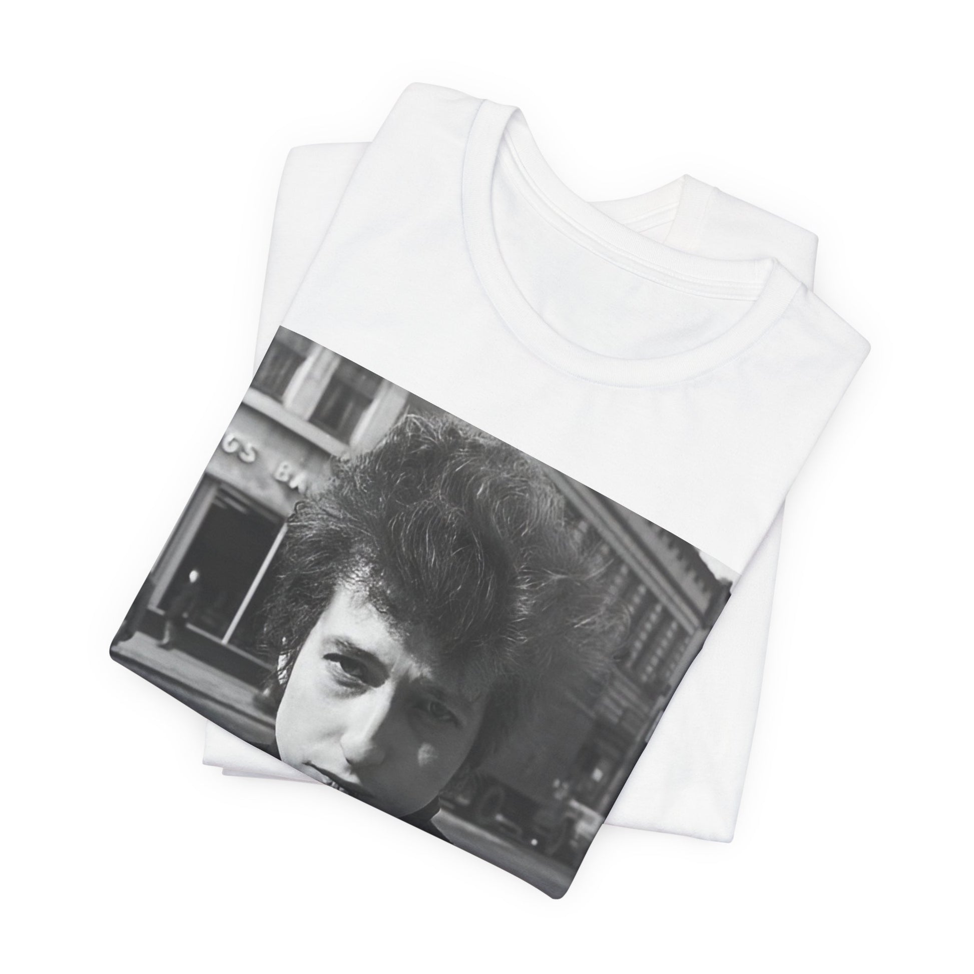 A black graphic t-shirt featuring a 60s black and white photo portrait of Bob Dylan.