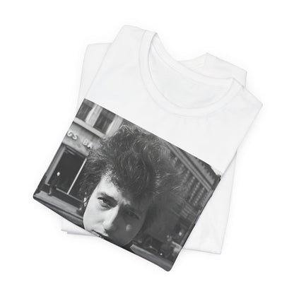 A black graphic t-shirt featuring a 60s black and white photo portrait of Bob Dylan.