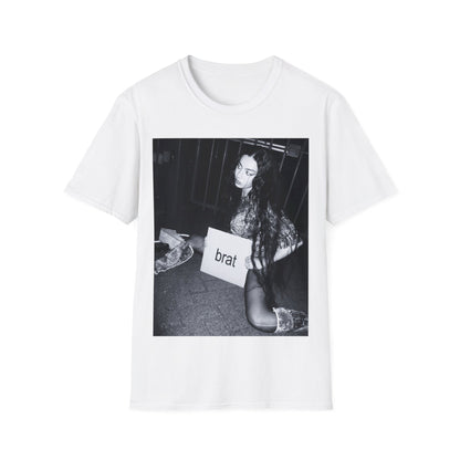 A black graphic t-shirt featuring a graphic related to Charli XCX's 'Brat' album.