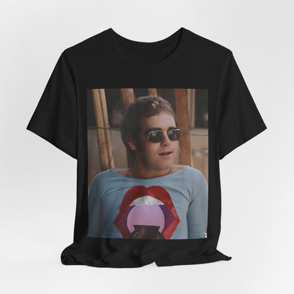 A black graphic t-shirt featuring a classic graphic related to Elton John's 'Tiny Dancer' song or era.