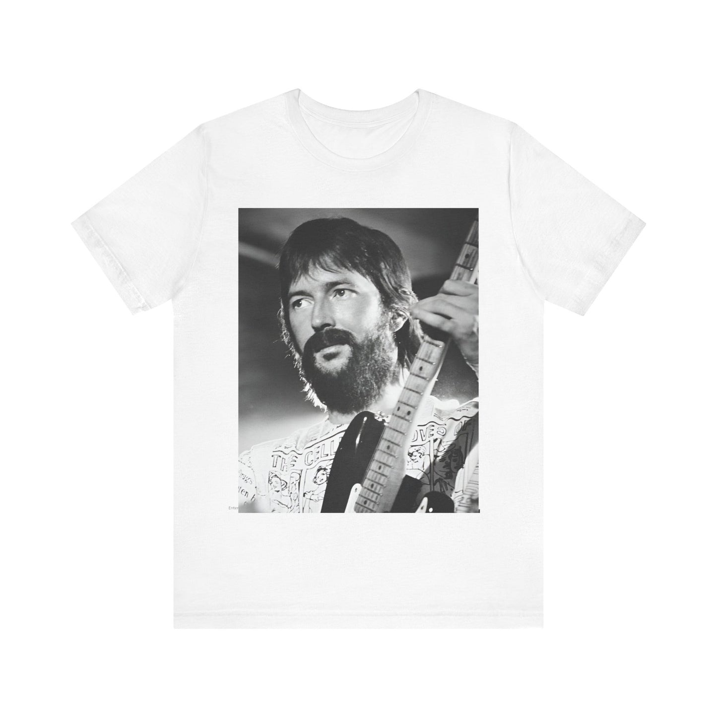 A black graphic t-shirt featuring a graphic of Eric Clapton as an authentic guitar god.