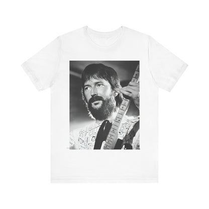 A black graphic t-shirt featuring a graphic of Eric Clapton as an authentic guitar god.