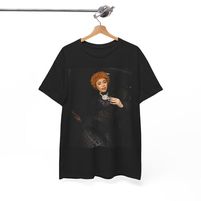 A black graphic t-shirt featuring a graphic of Ice Spice with her classic curly red hair, designed with an aesthetic style.