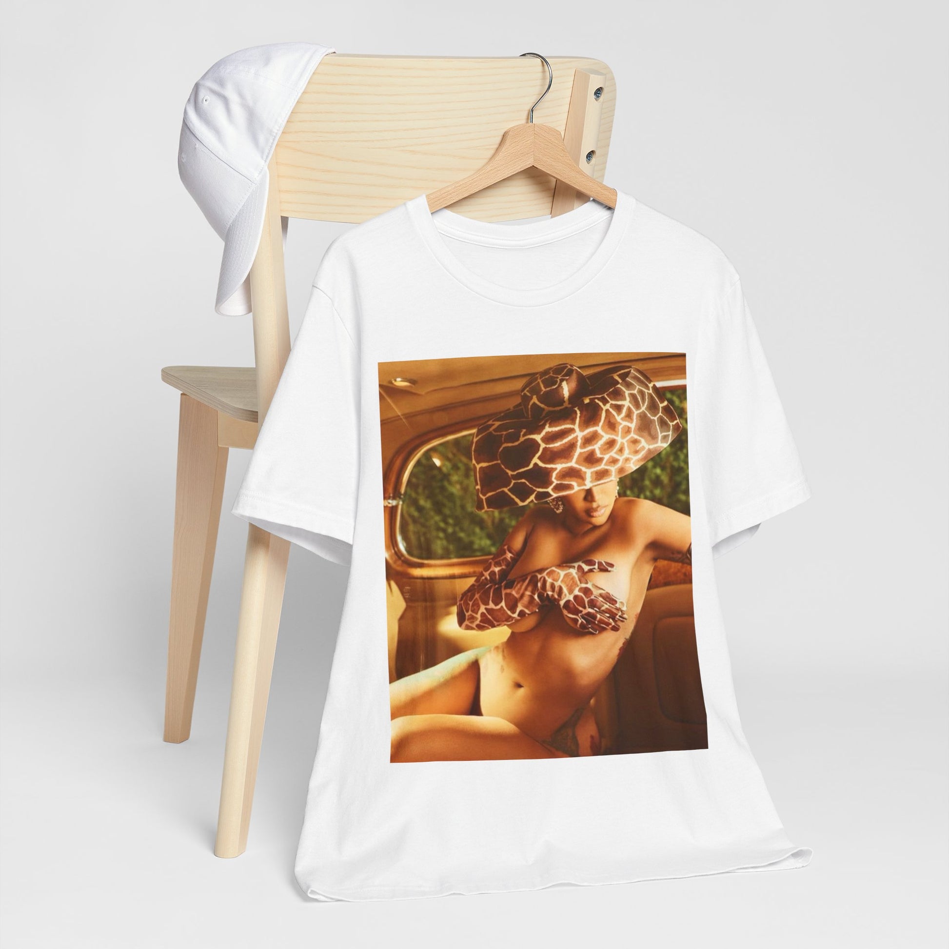 A black graphic t-shirt featuring a graphic of Cardi B as a hip hop culture phenomenon.