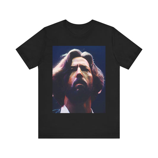 A black graphic t-shirt featuring a graphic related to Eric Clapton's 'Tears in Heaven' song or era.