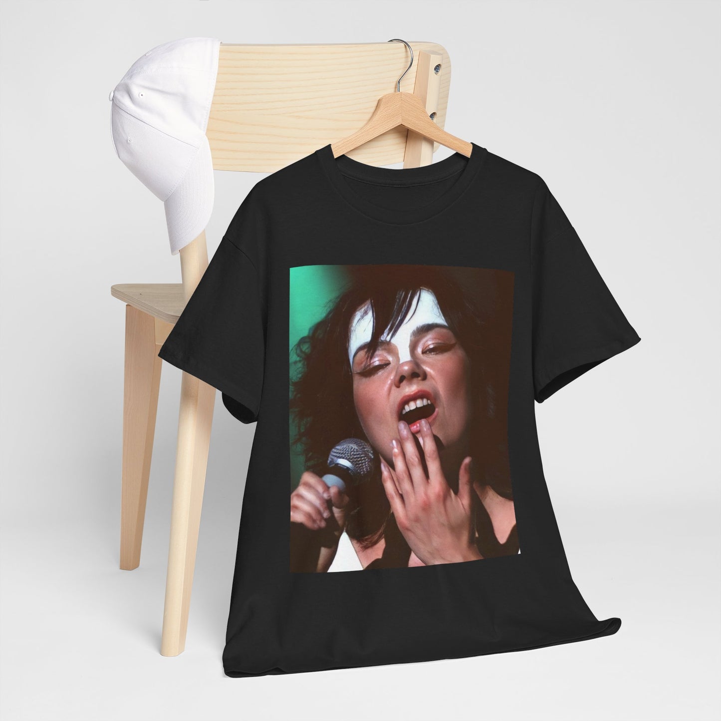 A black graphic t-shirt featuring a graphic of Bjork showcasing her bold and experimental fashion from the 1990s.