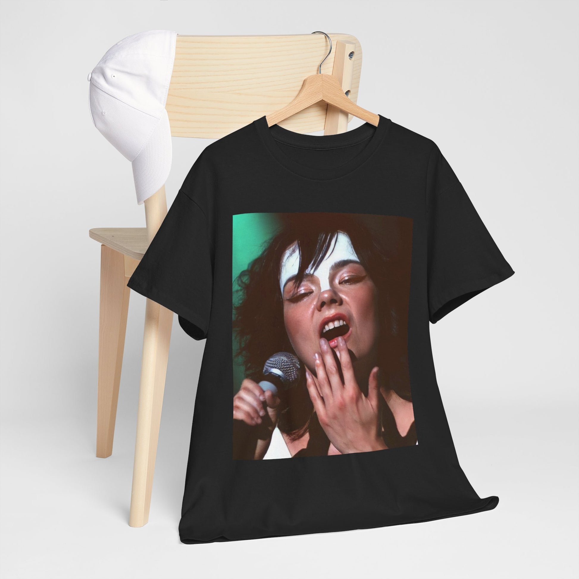 A black graphic t-shirt featuring a graphic of Bjork showcasing her bold and experimental fashion from the 1990s.