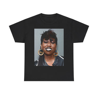 A black graphic t-shirt featuring a bold graphic of Missy Elliott as a rap superstar.