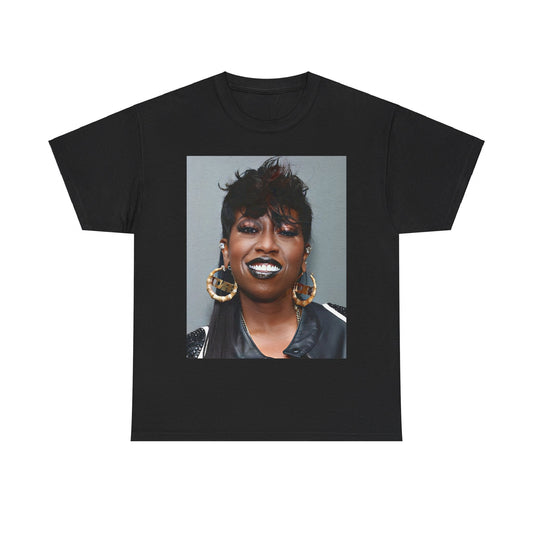 A black graphic t-shirt featuring a bold graphic of Missy Elliott as a rap superstar.