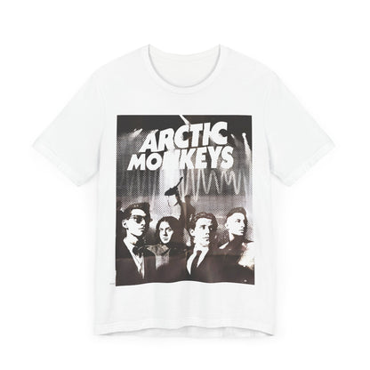 A black graphic t-shirt featuring a retro-style logo for the band Arctic Monkeys.