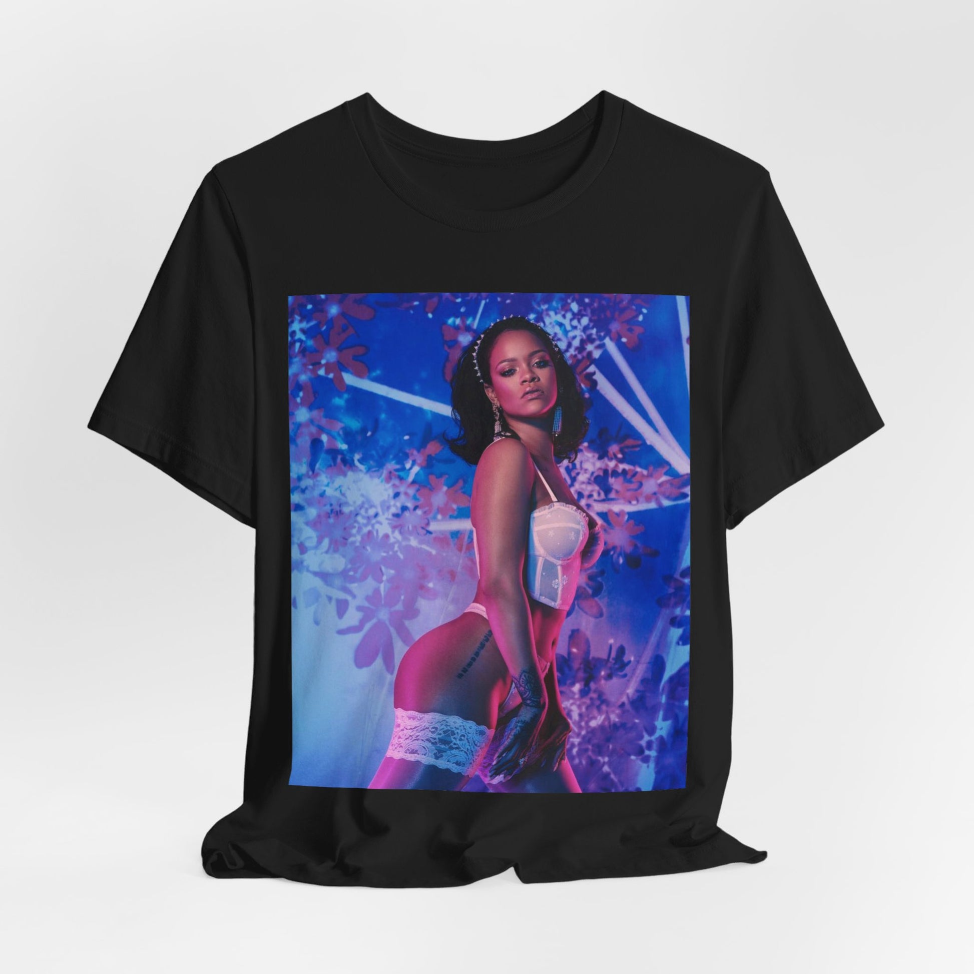 A black graphic t-shirt featuring a graphic of Rihanna as a lingerie goddess.