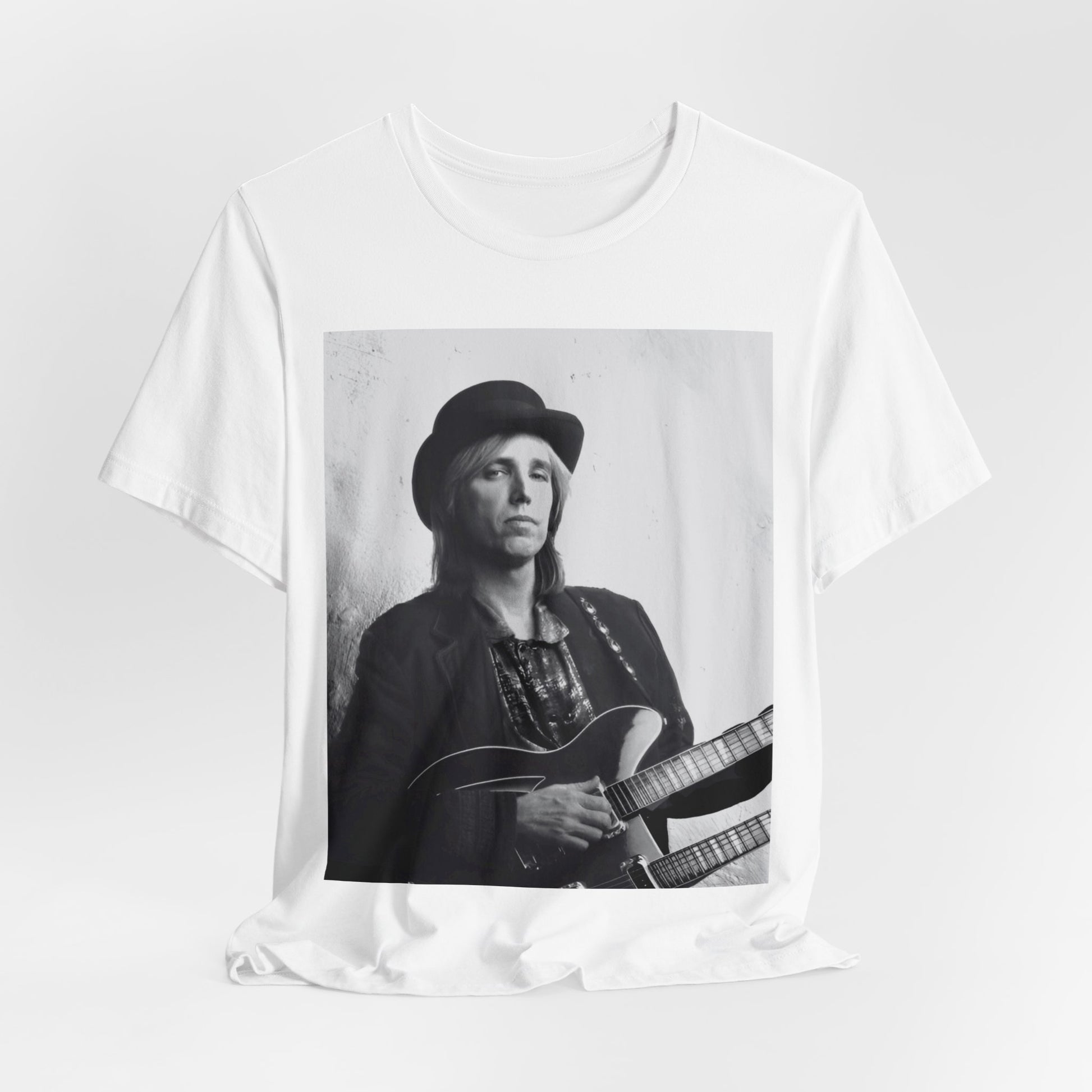 A black graphic t-shirt featuring a graphic related to Tom Petty's 'Wildflowers' album era.