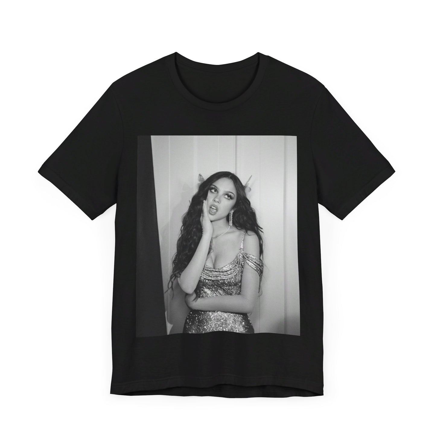A black graphic t-shirt featuring a black and white, monochrome graphic or photo of Olivia Rodrigo.