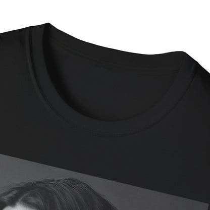 A black graphic t-shirt featuring a 90s-style black and white portrait of Alanis Morissette, showing her with a poised or thoughtful expression.