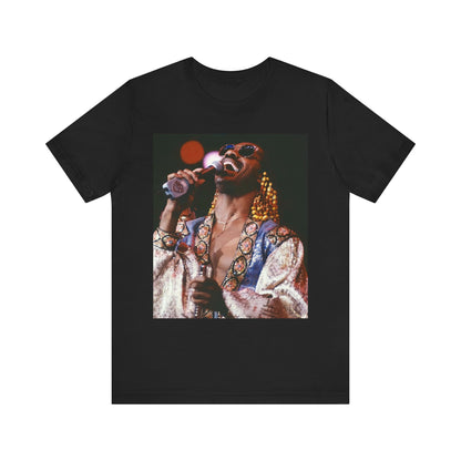 A black graphic t-shirt featuring a 70s vintage soul icon graphic of Stevie Wonder.