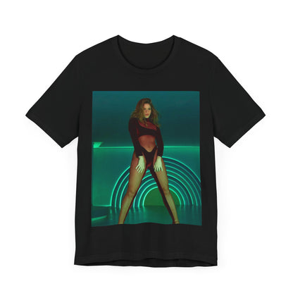 A black graphic t-shirt featuring a graphic of Shakira as the Queen of the Dance Floor.