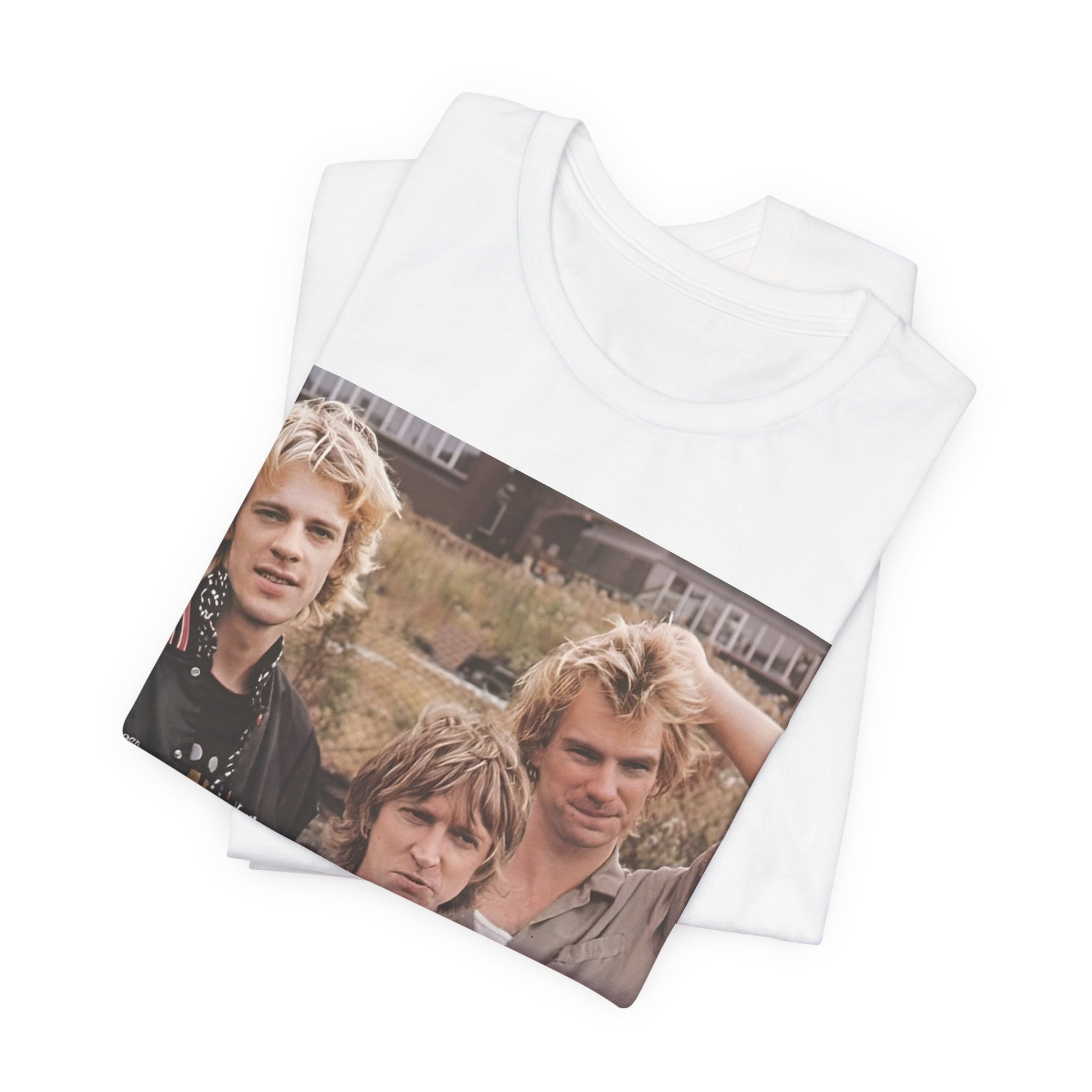 A black graphic t-shirt featuring a graphic of The Police as a timeless three-piece band.