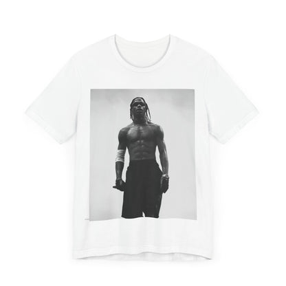 A black graphic t-shirt featuring a black and white portrait photo of Travis Scott.