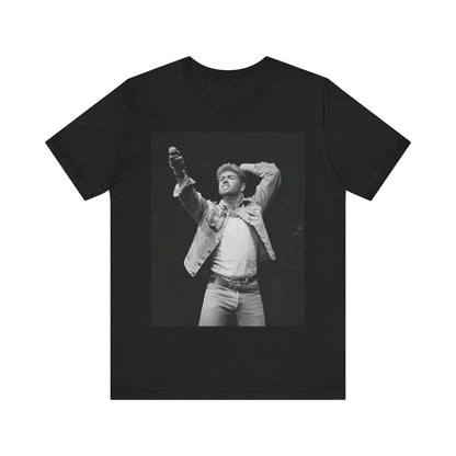 A black graphic t-shirt featuring a graphic or photo of George Michael performing live on stage.