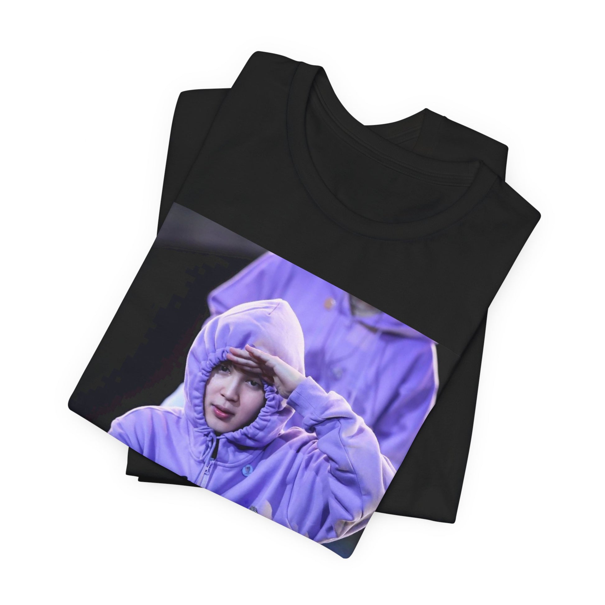 A black graphic t-shirt featuring an authentic live performance graphic of Jimin.