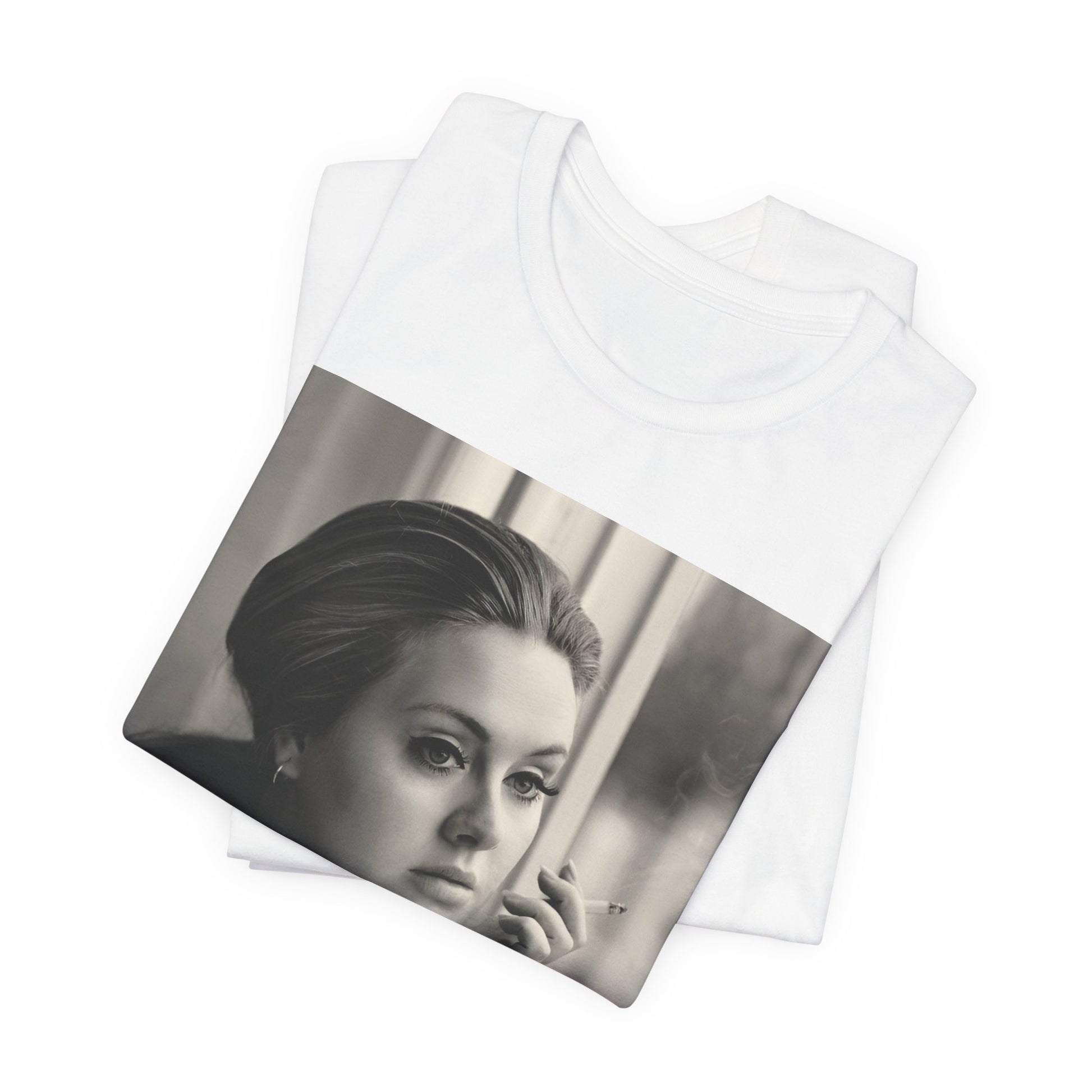 A black graphic t-shirt featuring a black and white photo of Adele, showing her with a serene or thoughtful expression.
