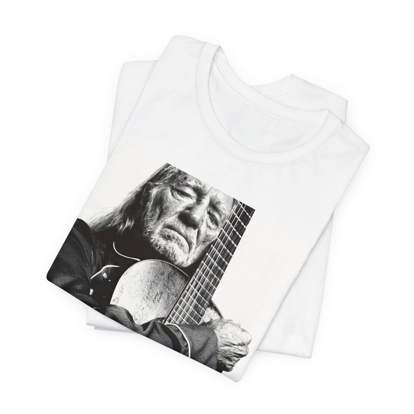 A black graphic t-shirt featuring a vintage country legend graphic of Willie Nelson.
