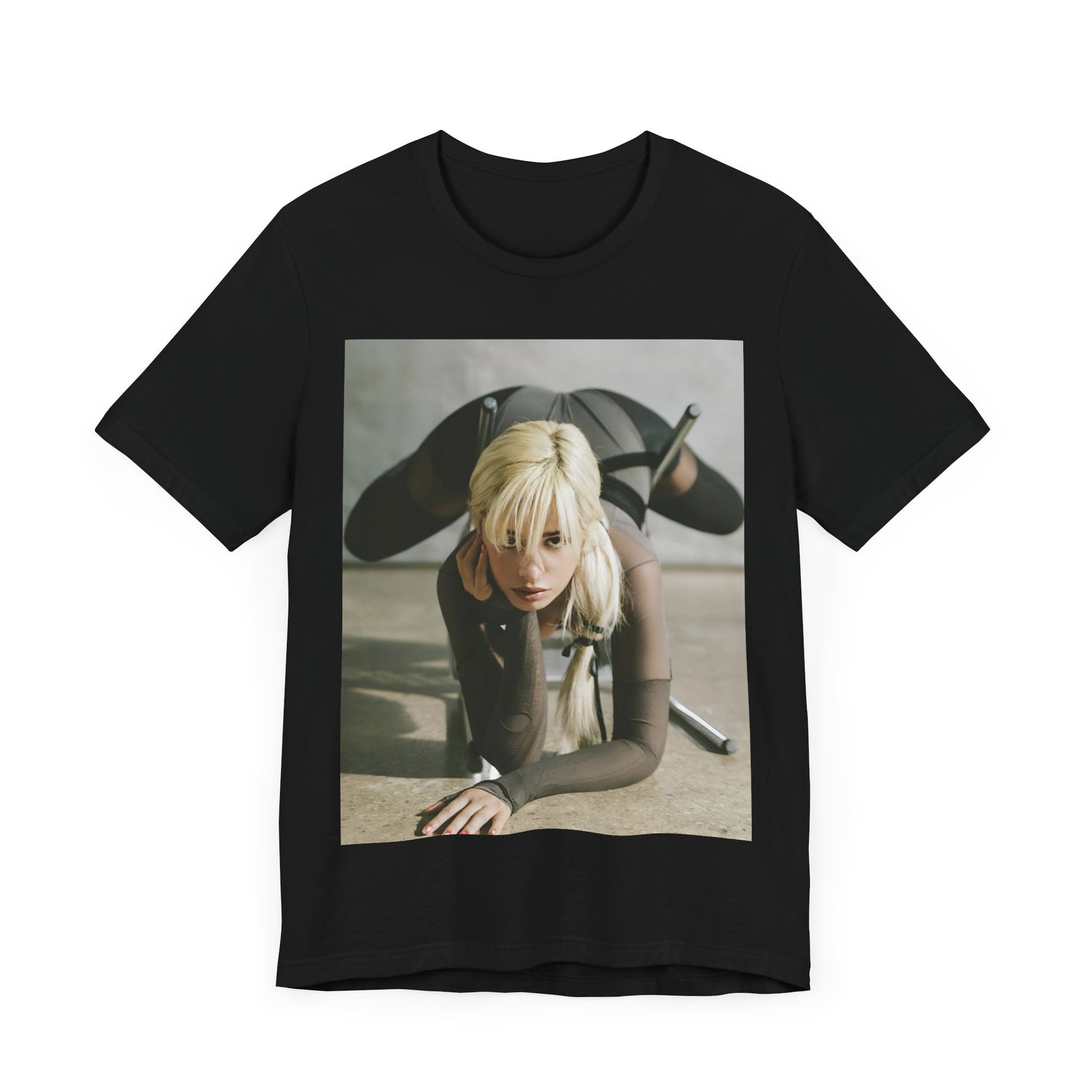 A black graphic t-shirt featuring a vintage-style graphic of Camila Cabello, possibly with a crown or 'Pop Queen' title.
