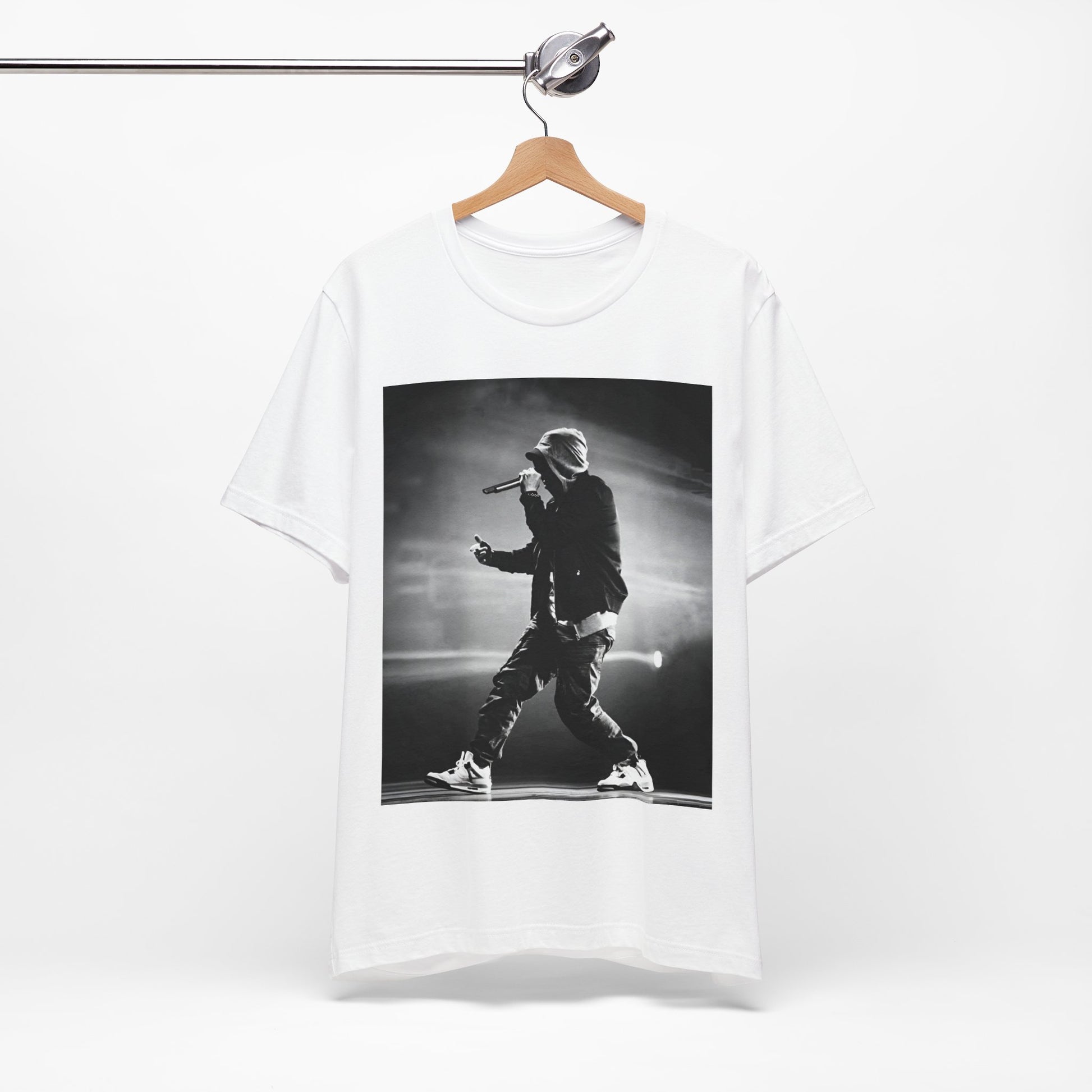 A black graphic t-shirt featuring a boxy hip hop aesthetic graphic of Eminem.