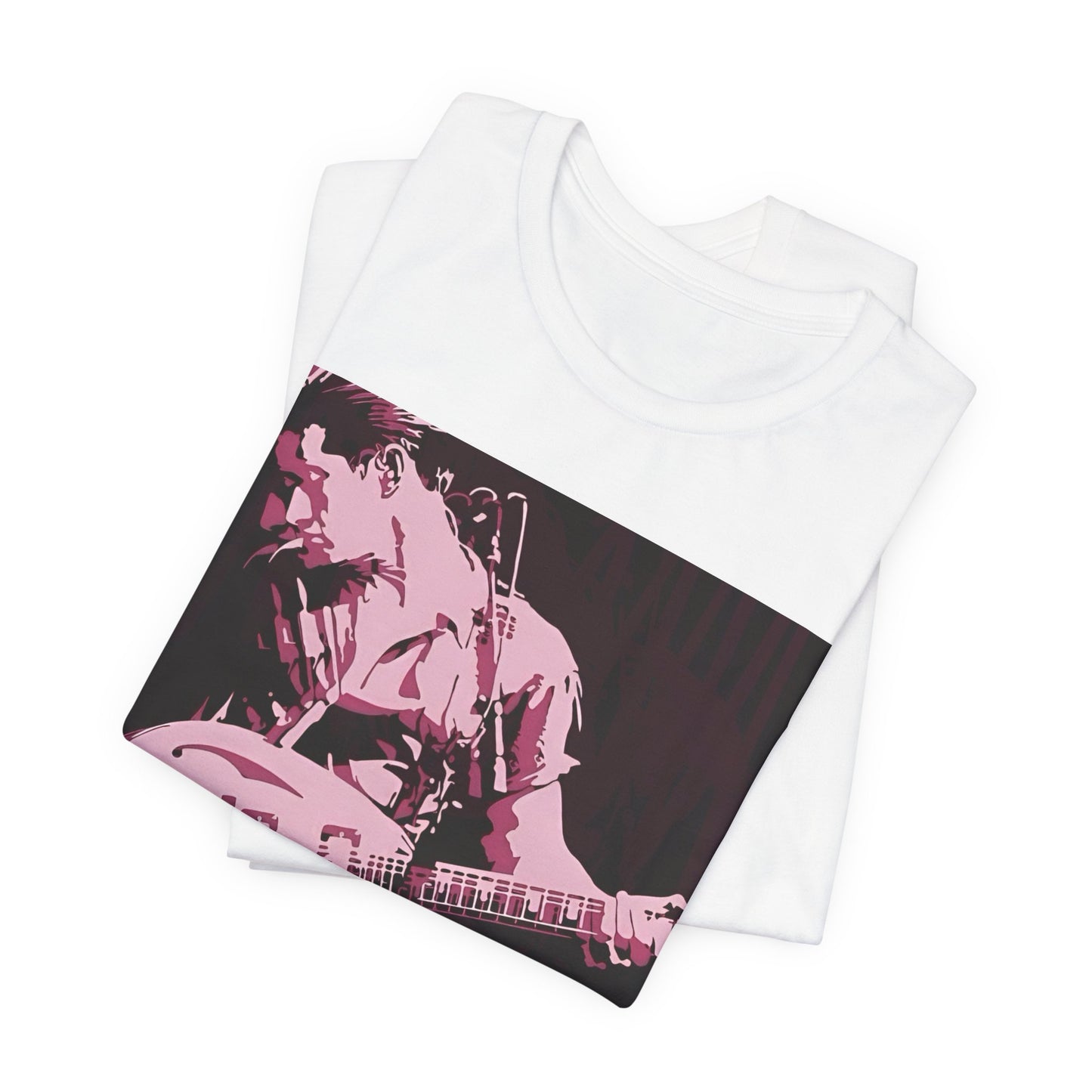 A black graphic t-shirt featuring the Arctic Monkeys logo in a prominent pink color, creating an aesthetic look.