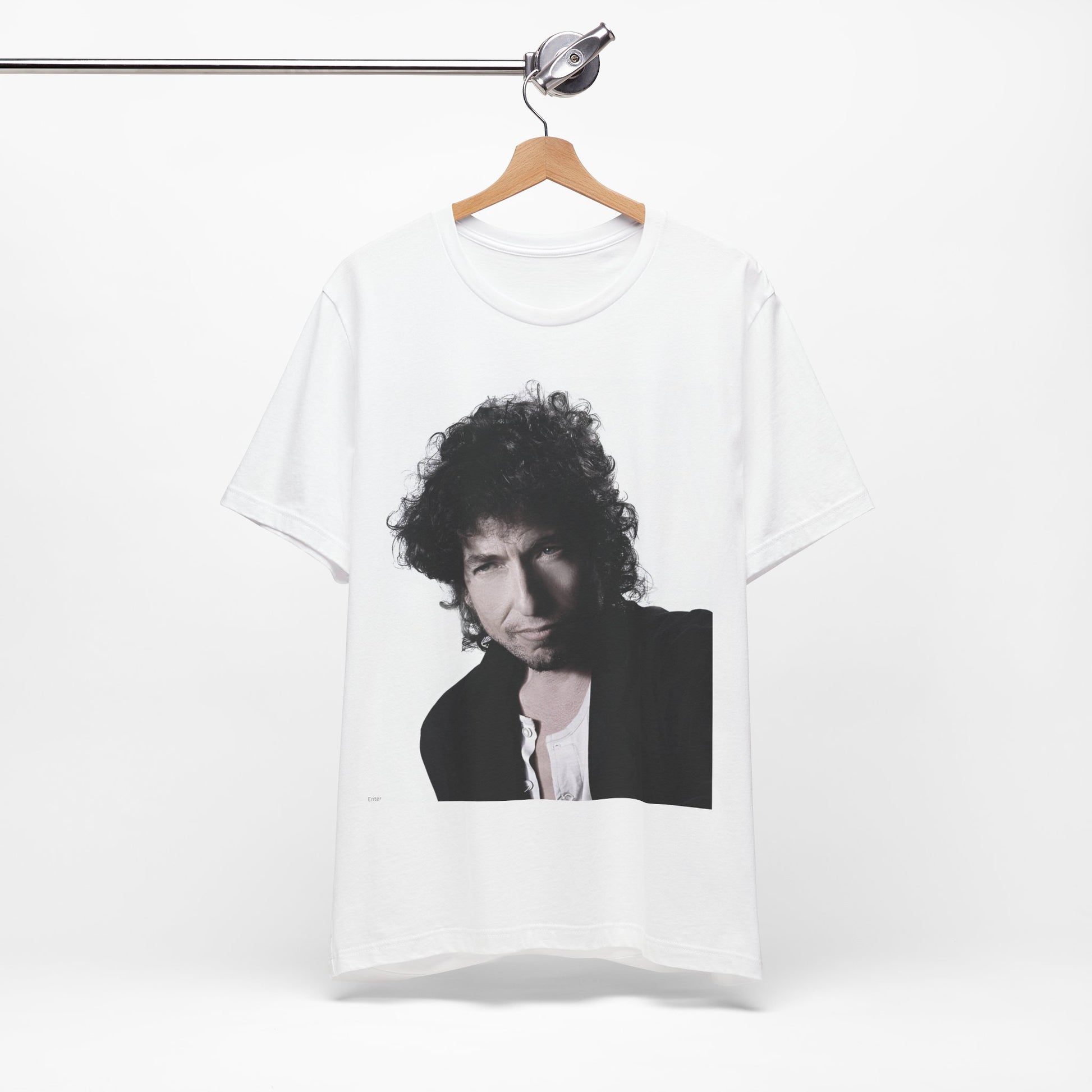 A black graphic t-shirt featuring a timeless folk rock graphic of Bob Dylan, possibly with his guitar or harmonica.