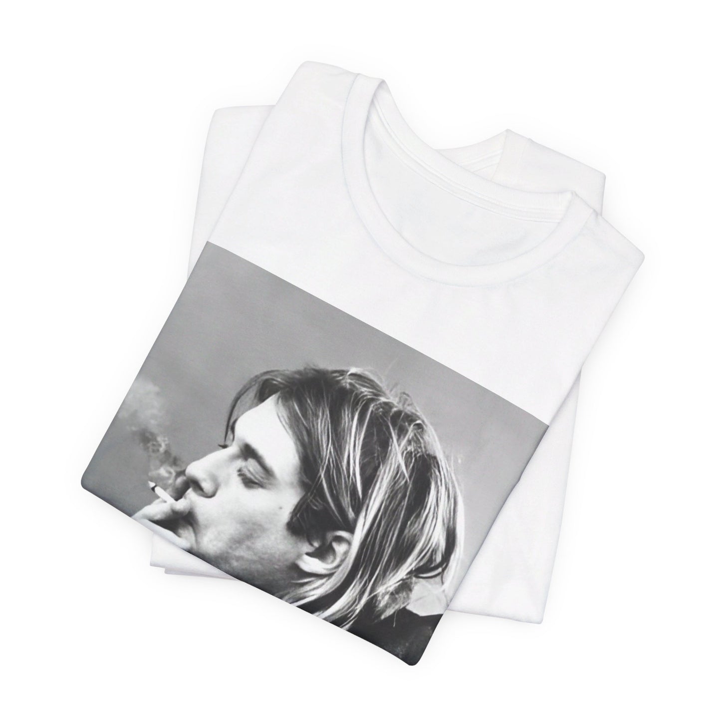 A black graphic t-shirt featuring a vintage photo of a Nirvana member with a cigarette.