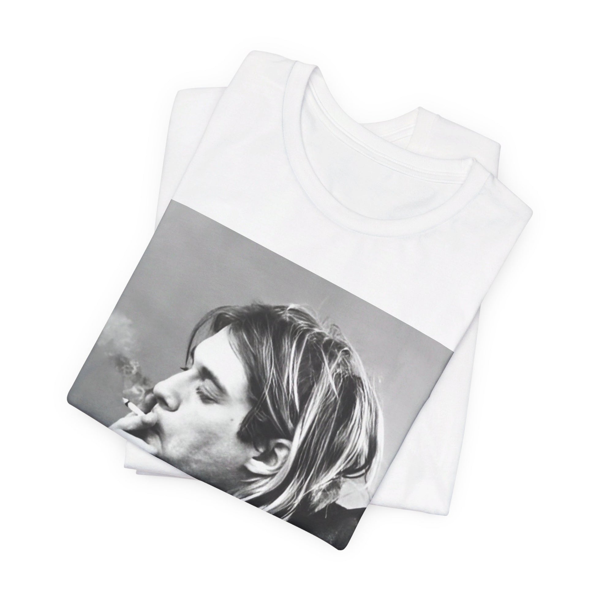 A black graphic t-shirt featuring a vintage photo of a Nirvana member with a cigarette.