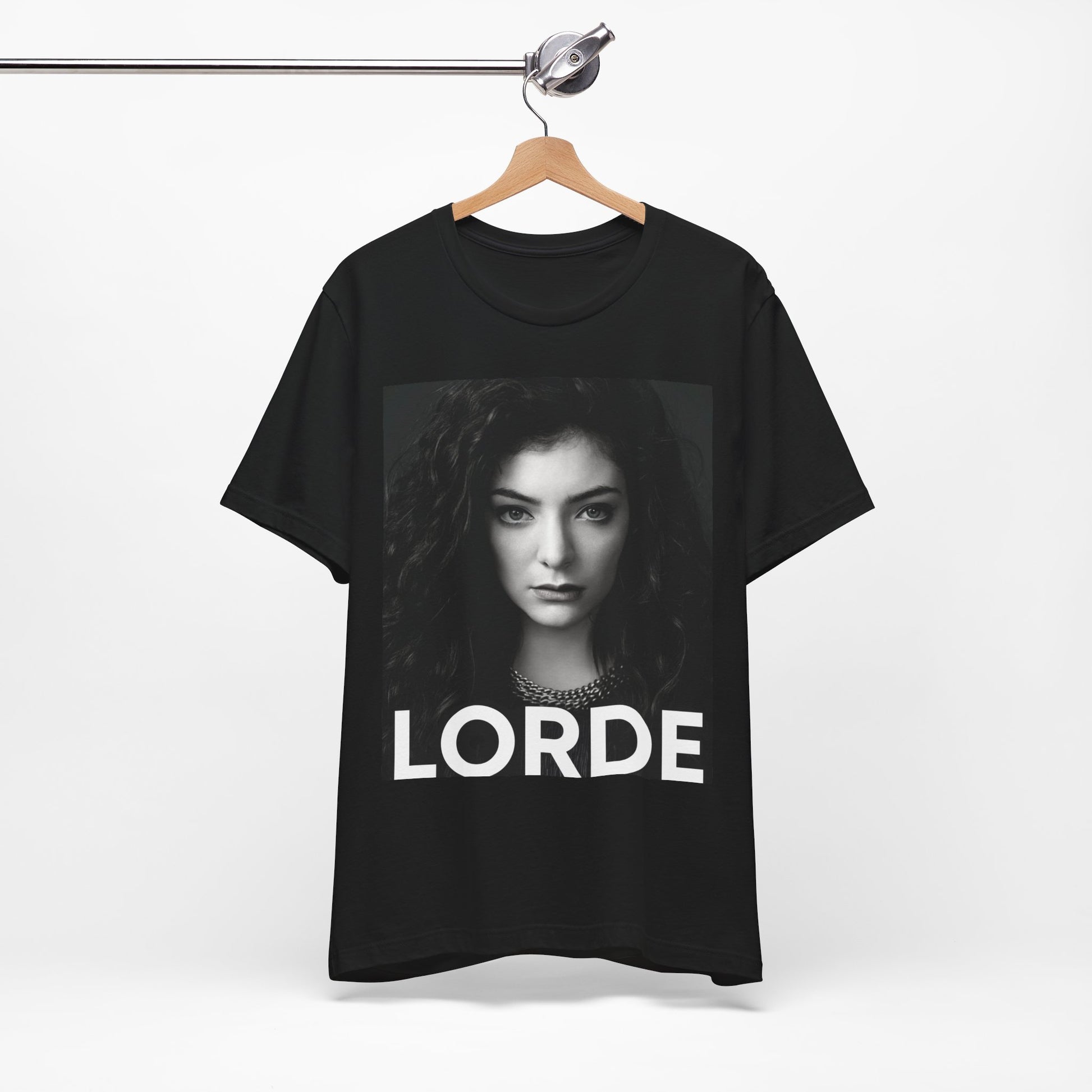 A black graphic t-shirt featuring a casual pop fan graphic of Lorde.