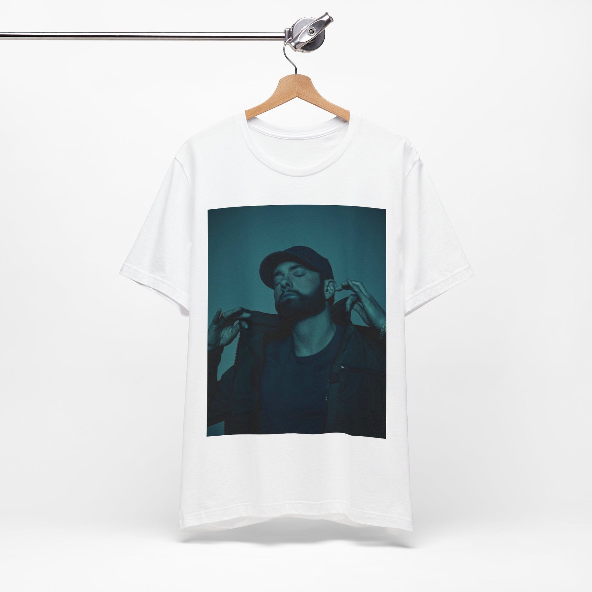 A black graphic t-shirt featuring a graphic of Eminem as a 'Rap God'.