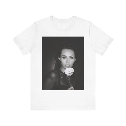 A black graphic t-shirt featuring a graphic related to Miley Cyrus' 'Flowers' song or era.