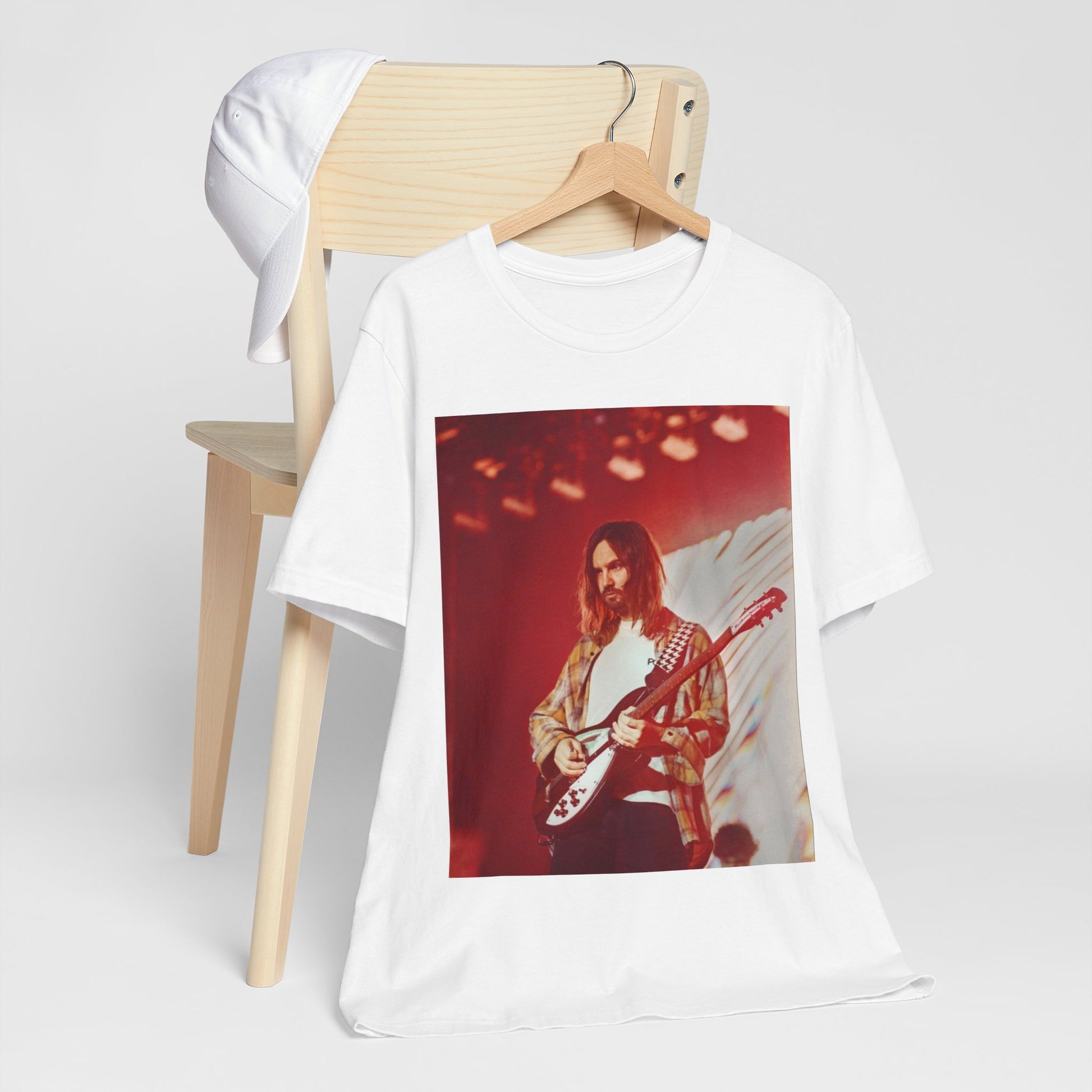 A black graphic t-shirt featuring a cool psychedelic journey graphic of Tame Impala.