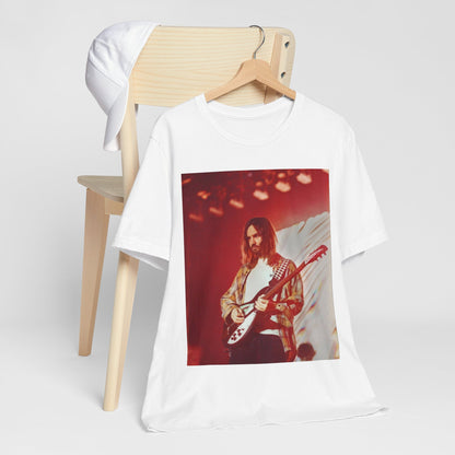 A black graphic t-shirt featuring a cool psychedelic journey graphic of Tame Impala.