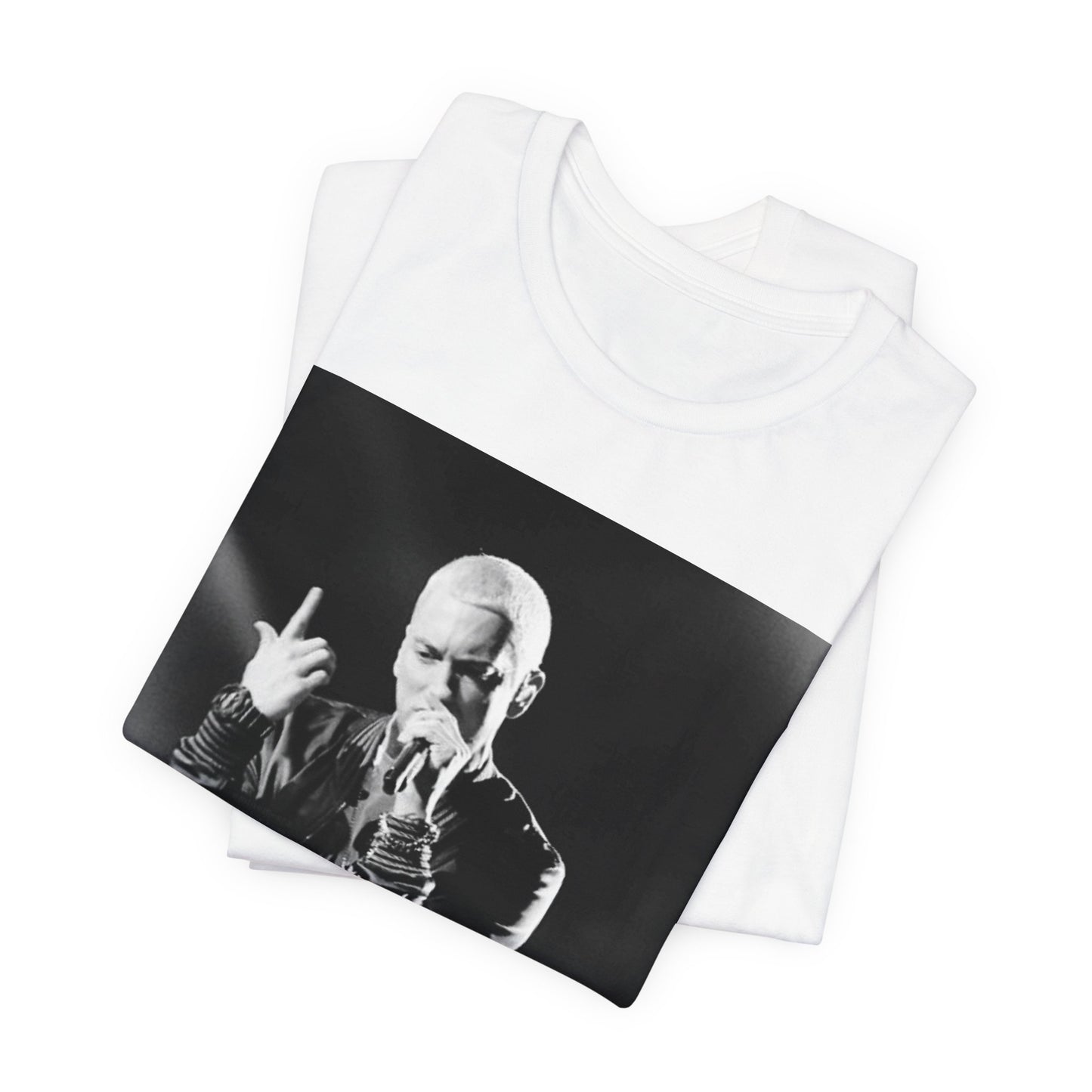 A black graphic t-shirt featuring a graphic or photo of Eminem performing live on stage.