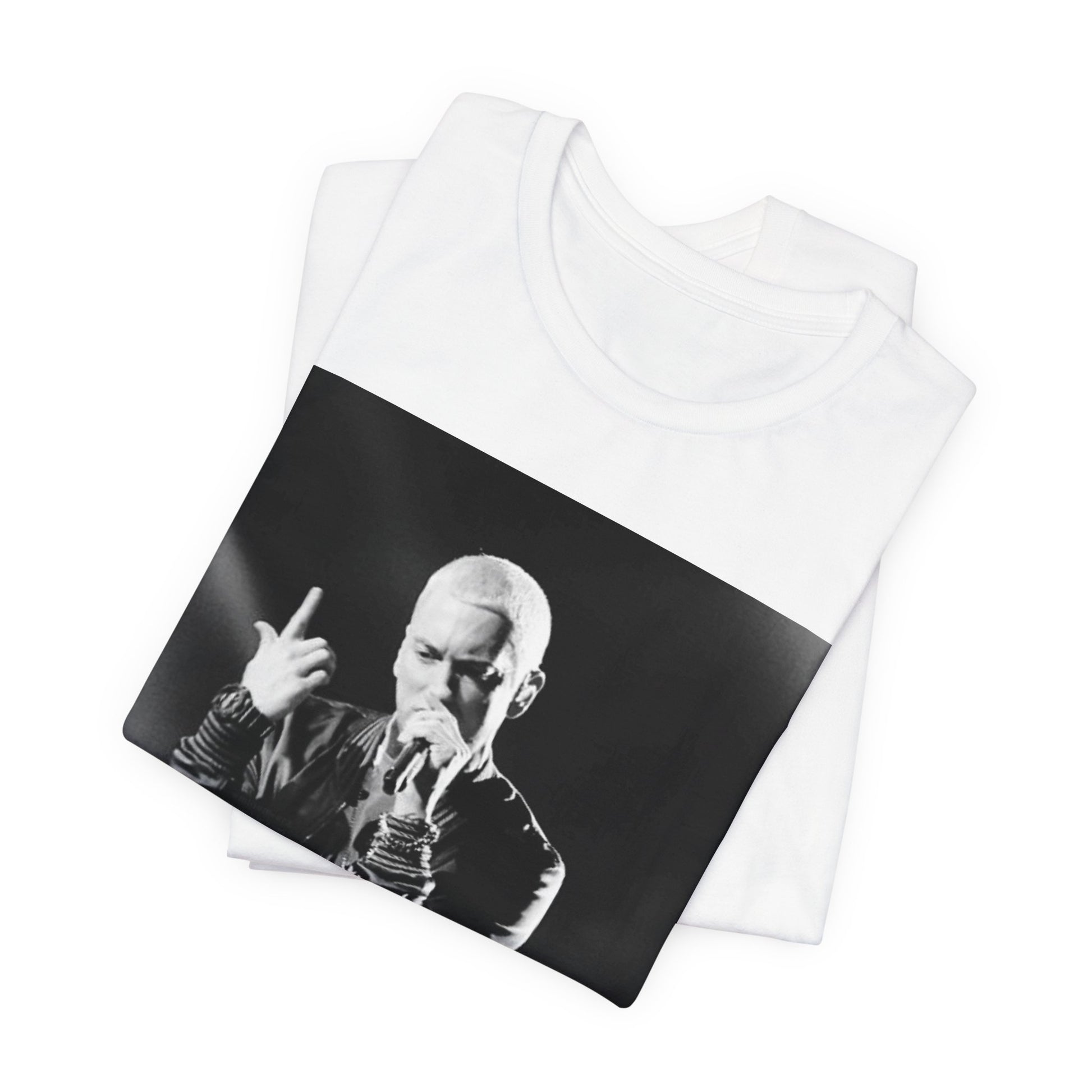 A black graphic t-shirt featuring a graphic or photo of Eminem performing live on stage.