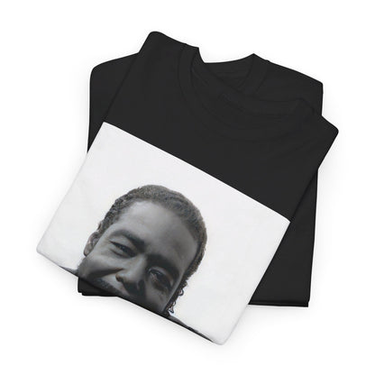 A black graphic t-shirt featuring a black and white photo of Barry White with his iconic smile.