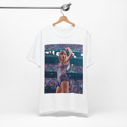 A black graphic t-shirt featuring a graphic or photo of Taylor Swift performing live on stage.