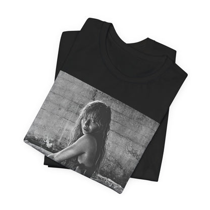 A black graphic t-shirt featuring a black and white, monochrome graphic or photo of Sabrina Carpenter.
