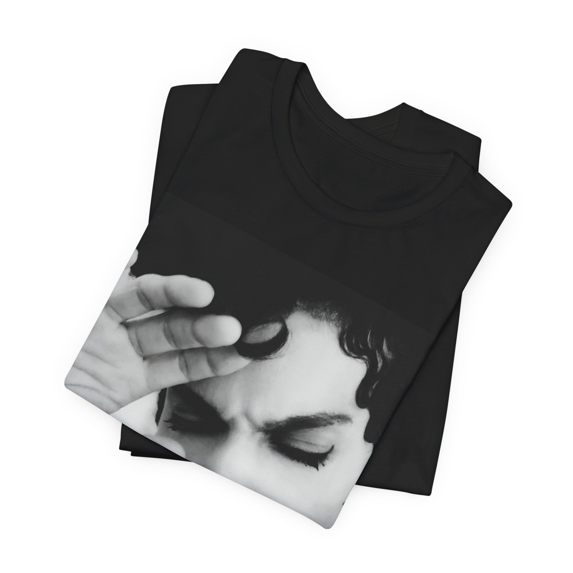 A black graphic t-shirt featuring a black and white graphic or photo portrait of Prince.