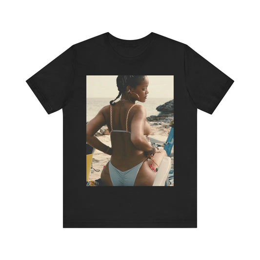 A black graphic t-shirt featuring a graphic of Rihanna as a bikini babe in paradise.