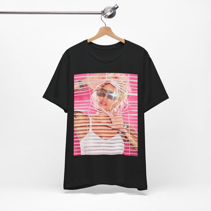 A black graphic t-shirt featuring a graphic of Karol G in a cool Latin trap style.