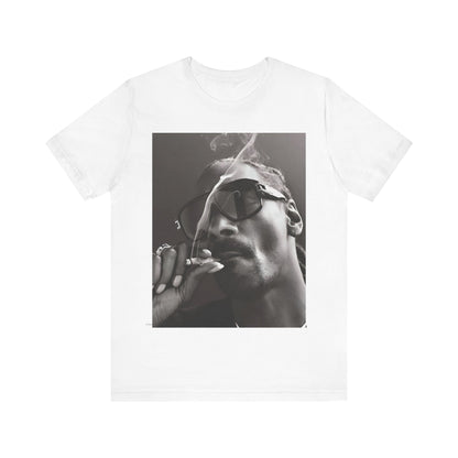 A black graphic t-shirt featuring an iconic black and white shaded portrait graphic of Snoop Dogg.