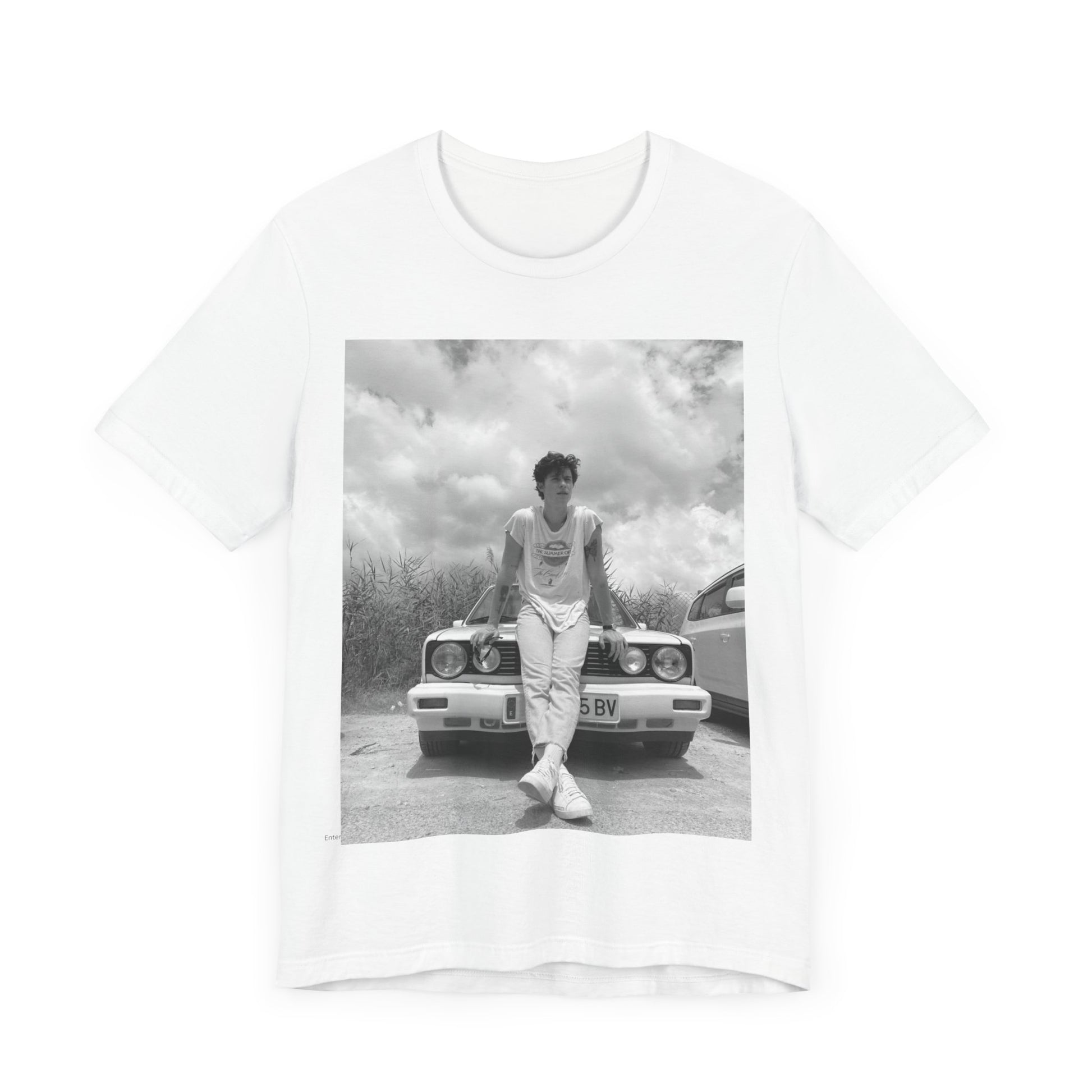 A black graphic t-shirt featuring a graphic of Shawn Mendes in an iconic tank top look.