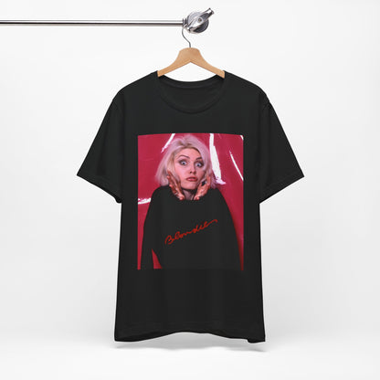 A black graphic t-shirt featuring a graphic related to Blondie's 'Atomic' song or era.