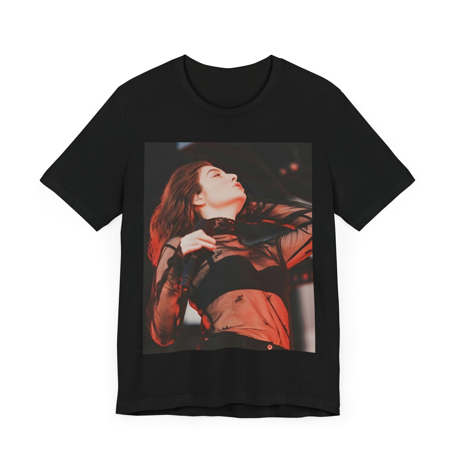 A black graphic t-shirt featuring a graphic of Lorde emphasizing raw emotion.