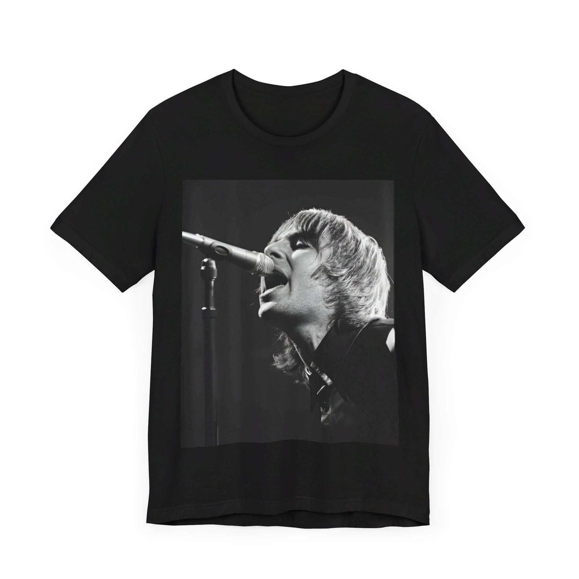 A black graphic t-shirt featuring a black and white graphic or photo of Liam Gallagher from Oasis performing live on stage.